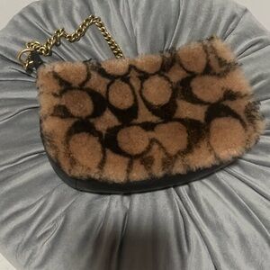 Coach X Jennifer Lopez Brown and Black Shoulder Bag with Elegant Design